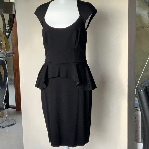 Elegant Black Peplum Dress - Picture 1 of 6